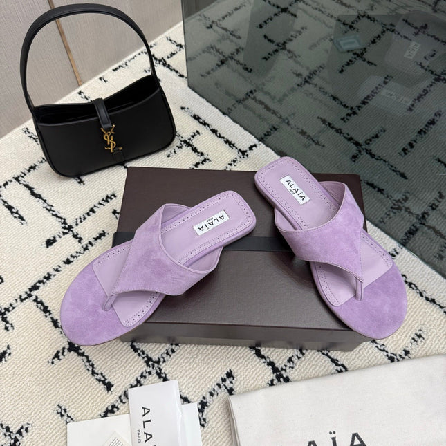 ALAIA 26S THONG MULE SANDALS IN PURPLE SUEDE