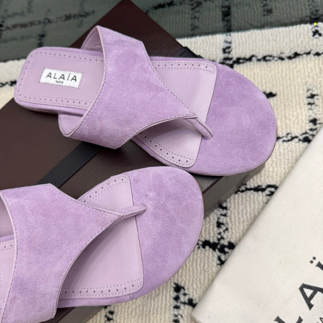 ALAIA 26S THONG MULE SANDALS IN PURPLE SUEDE