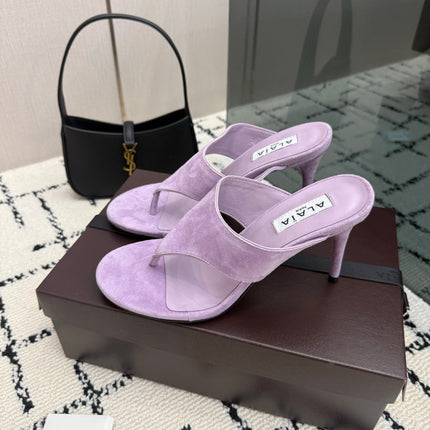 ALAIA 26S HEELED THONG MULE SANDALS IN PURPLE SUEDE