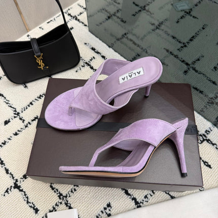 ALAIA 26S HEELED THONG MULE SANDALS IN PURPLE SUEDE