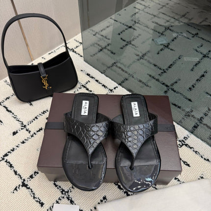 ALAIA 26S THONG MULE SANDALS IN BLACK CALFSKIN