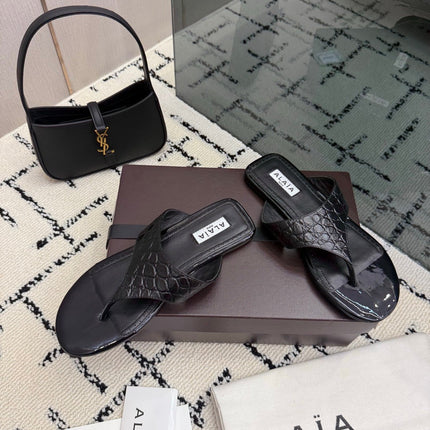 ALAIA 26S THONG MULE SANDALS IN BLACK CALFSKIN