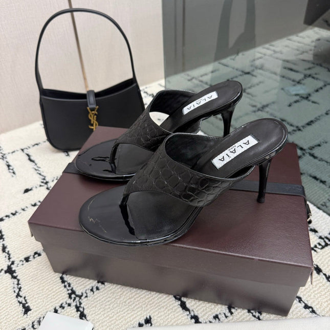 ALAIA 26S HEELED THONG MULE SANDALS IN BLACK CALFSKIN