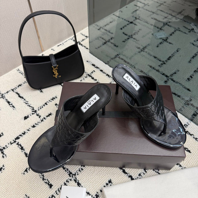 ALAIA 26S HEELED THONG MULE SANDALS IN BLACK CALFSKIN