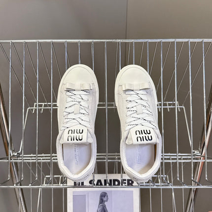 MIUMIU 25S SNEAKERS IN WHITE SUEDE