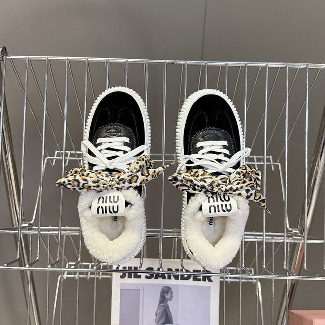 MIUMIU 25S SNEAKERS 45MM IN BLACK SUEDE WITH LEOPARD-PRINT LACES SHEARLING
