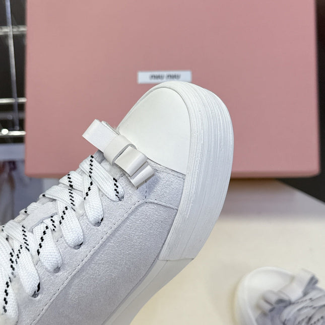 MIUMIU 25S SNEAKERS IN WHITE SUEDE WITH SHEARLING