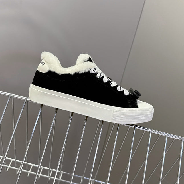 MIUMIU 25S SNEAKERS IN BLACK SUEDE WITH SHEARLING