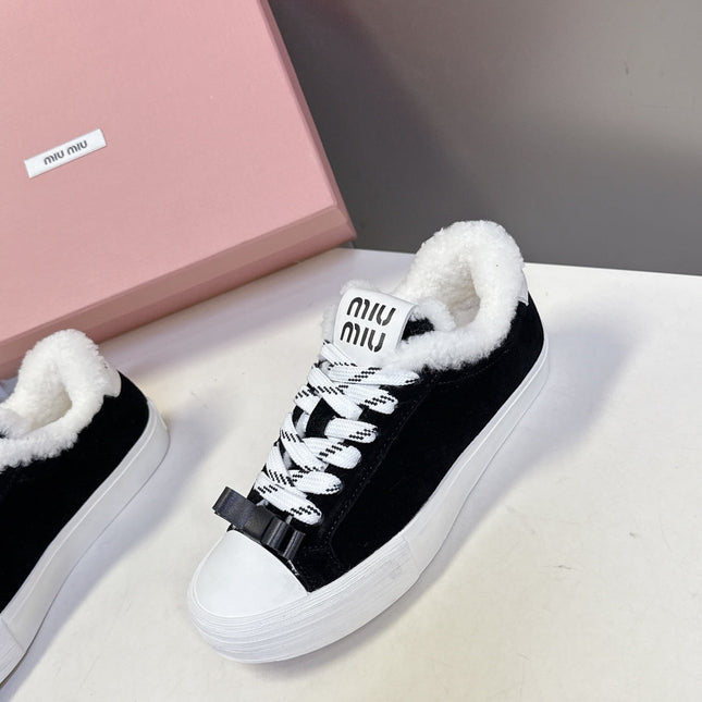 MIUMIU 25S SNEAKERS IN BLACK SUEDE WITH SHEARLING