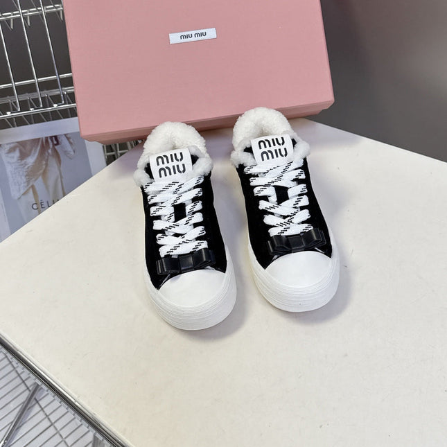 MIUMIU 25S SNEAKERS IN BLACK SUEDE WITH SHEARLING