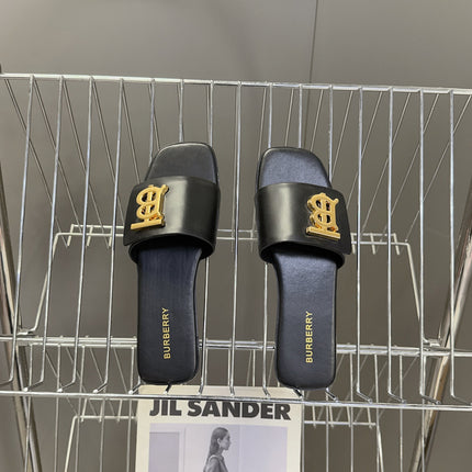 BURBERRY 26S FLAT SLIDE SANDALS IN BLACK CALFSKIN GOLD HARDWARE