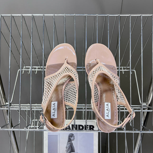 ALAIA 26S MESH THONG HEELS 55 MM IN PALE PINK PATENT CALFSKIN