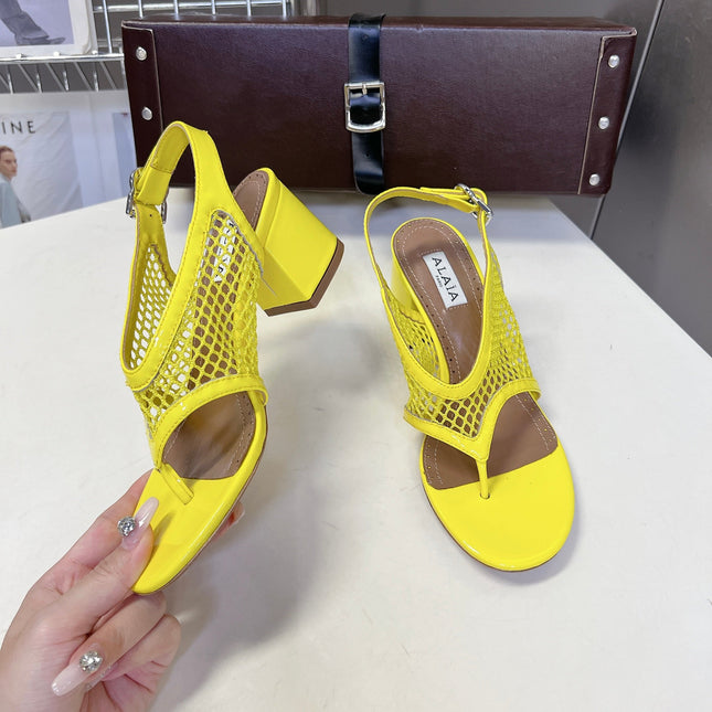 ALAIA 26S MESH THONG HEELS 55 MM IN YELLOW PATENT CALFSKIN