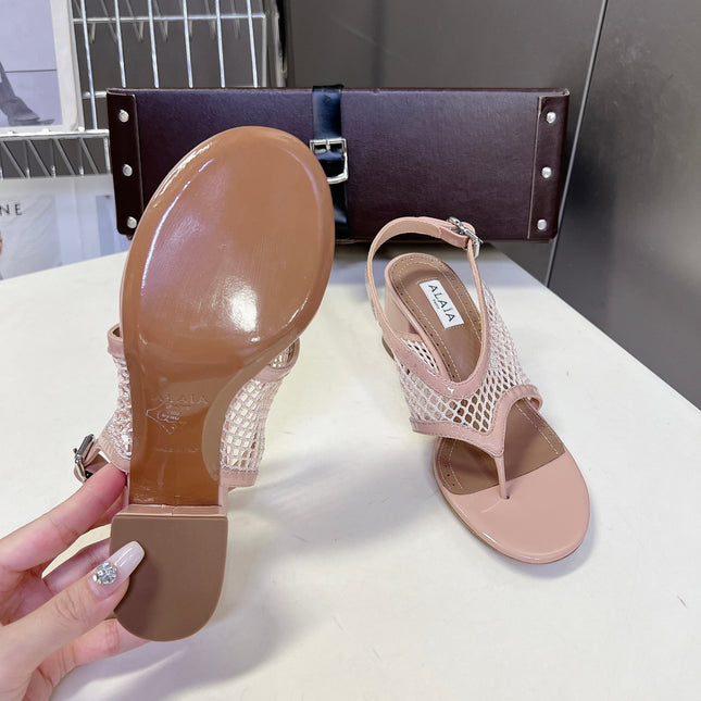 ALAIA 26S MESH THONG HEELS 55 MM IN PALE PINK PATENT CALFSKIN