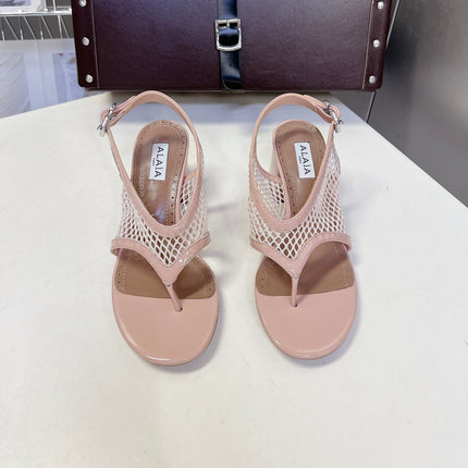 ALAIA 26S MESH THONG HEELS 55 MM IN PALE PINK PATENT CALFSKIN