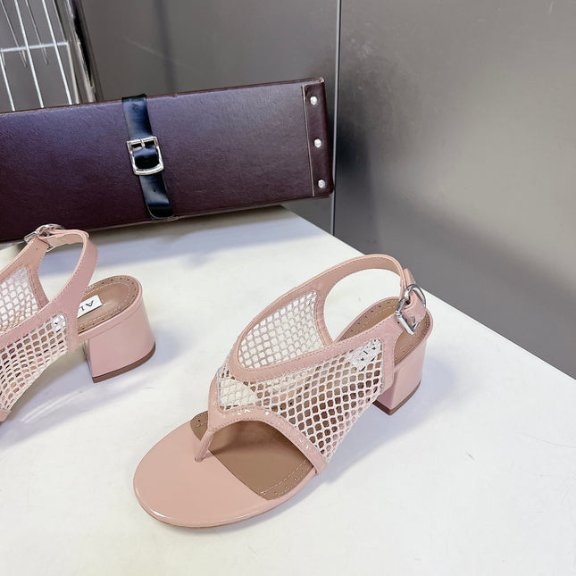 ALAIA 26S MESH THONG HEELS 55 MM IN PALE PINK PATENT CALFSKIN