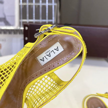 ALAIA 26S MESH THONG HEELS 55 MM IN YELLOW PATENT CALFSKIN
