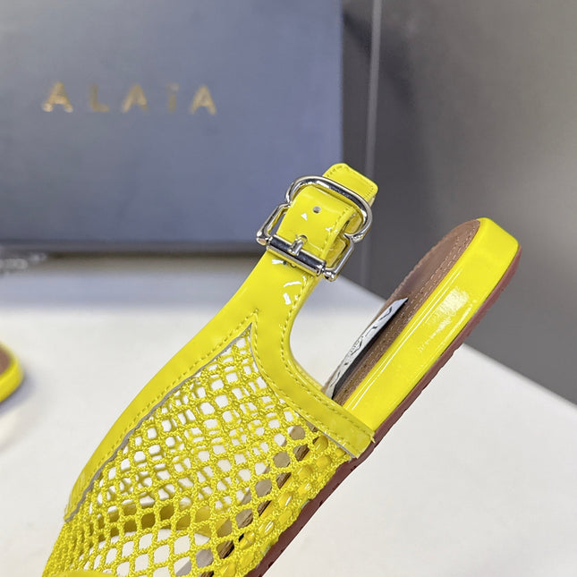 ALAIA 26S FLAT MESH THONG SANDALS IN YELLOW PATENT CALFSKIN