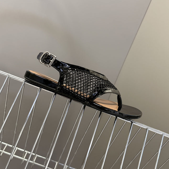 ALAIA 26S FLAT MESH THONG SANDALS IN BLACK PATENT CALFSKIN