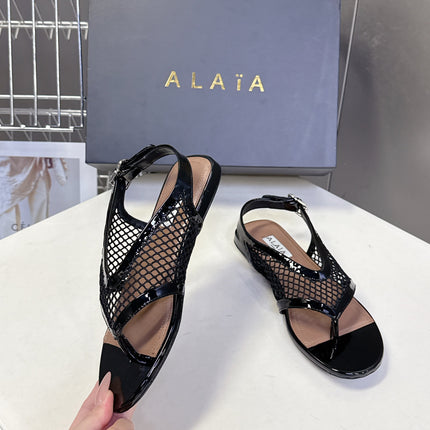ALAIA 26S FLAT MESH THONG SANDALS IN BLACK PATENT CALFSKIN