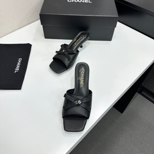 CHANEL 26S HIGH HEEL MULE SANDALS 50 MM IN BLACK LAMBSKIN WITH BOW DETAIL