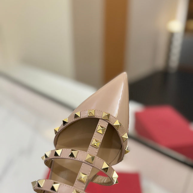 VALENTINO 26S STUDDED FLAT MULES IN NUDE PATENT CALFSKIN