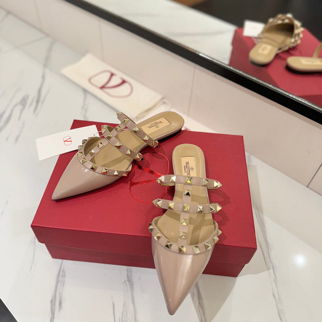 VALENTINO 26S STUDDED FLAT MULES IN NUDE PATENT CALFSKIN