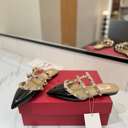 VALENTINO 26S STUDDED FLAT MULES IN BLACK PATENT CALFSKIN