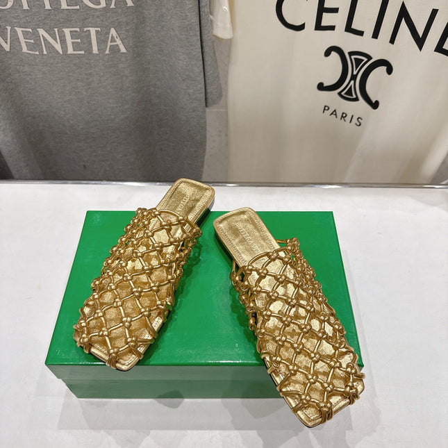 BOTTEGA VENETA 26S WOVEN MULES IN GOLD LAMBSKIN