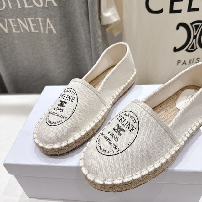 CELINE 26S MAISON PARIS EMBLEM ESPADRILLE FLATS IN IVORY WHITE CANVAS