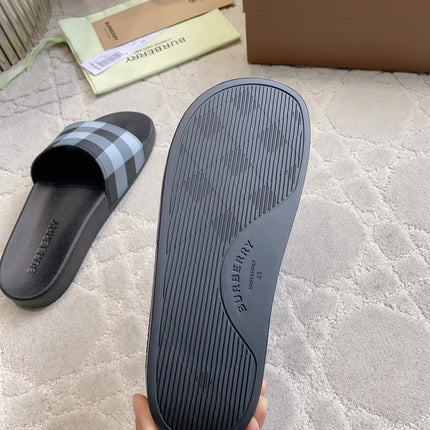 BURBERRY 26S CHECK PRINT RUBBER SLIDES IN BLACK CALFSKIN