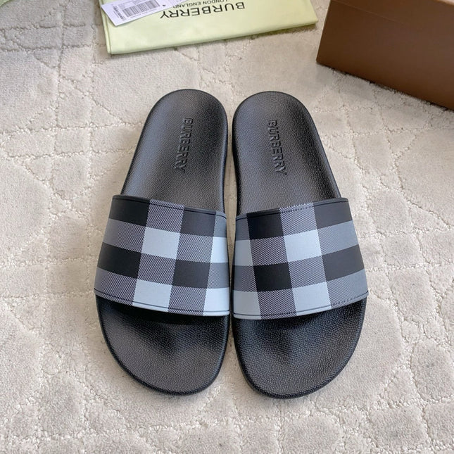 BURBERRY 26S CHECK PRINT RUBBER SLIDES IN BLACK CALFSKIN