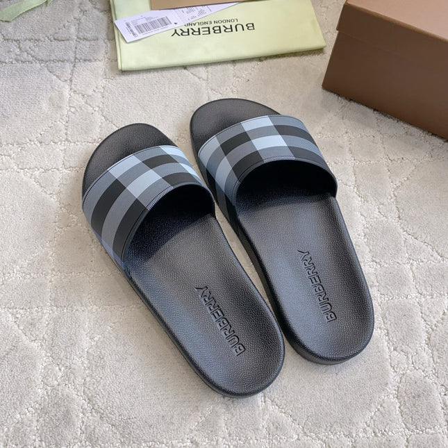 BURBERRY 26S CHECK PRINT RUBBER SLIDES IN BLACK CALFSKIN