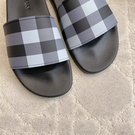 BURBERRY 26S CHECK PRINT RUBBER SLIDES IN BLACK CALFSKIN
