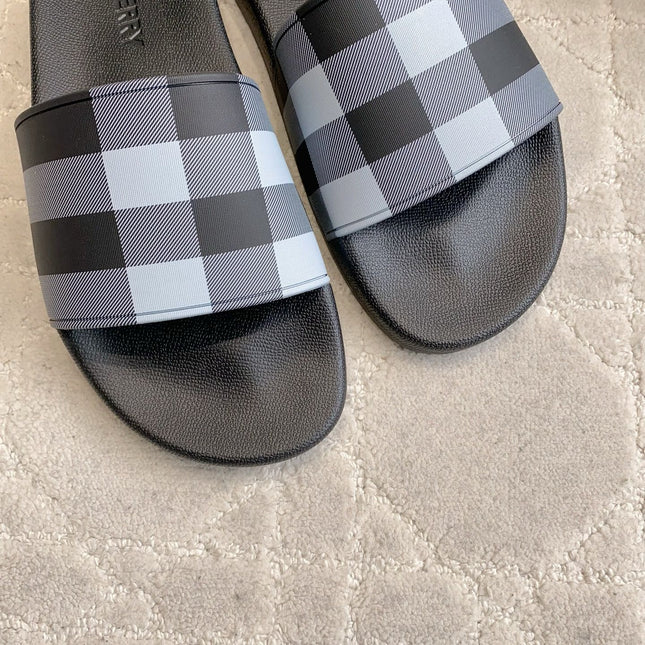 BURBERRY 26S CHECK PRINT RUBBER SLIDES IN BLACK CALFSKIN