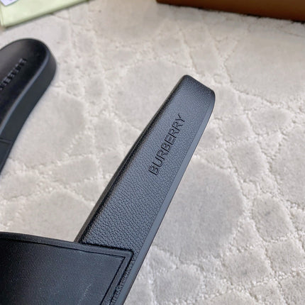 BURBERRY 26S EQUESTRIAN KNIGHT RUBBER SLIDES IN BLACK CALFSKIN