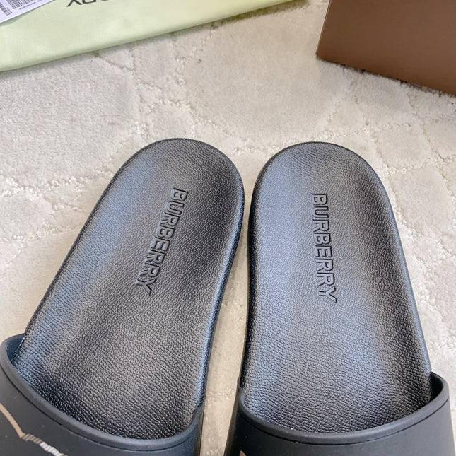 BURBERRY 26S EQUESTRIAN KNIGHT RUBBER SLIDES IN BLACK CALFSKIN