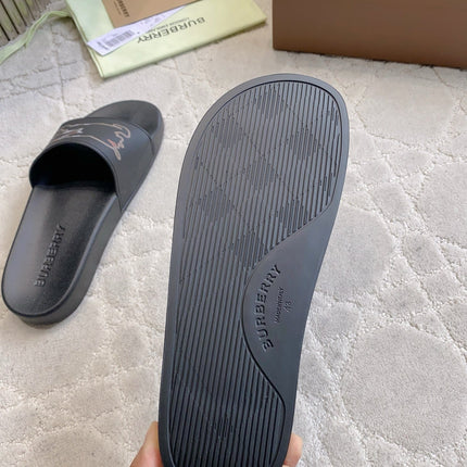 BURBERRY 26S EQUESTRIAN KNIGHT RUBBER SLIDES IN BLACK CALFSKIN