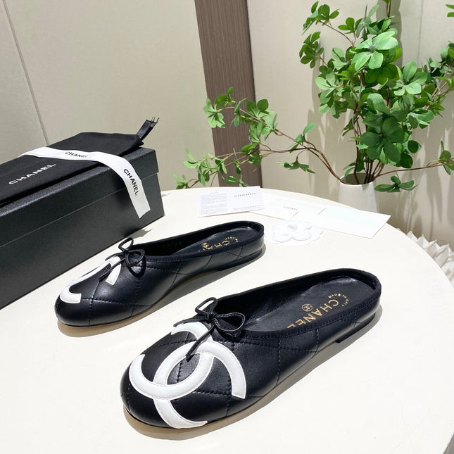 CHANEL 26S FLAT MULES IN BLACK LAMBSKIN