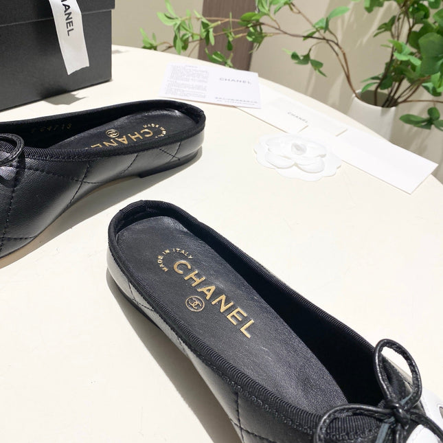 CHANEL 26S FLAT MULES IN BLACK LAMBSKIN