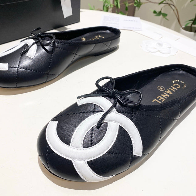 CHANEL 26S FLAT MULES IN BLACK LAMBSKIN