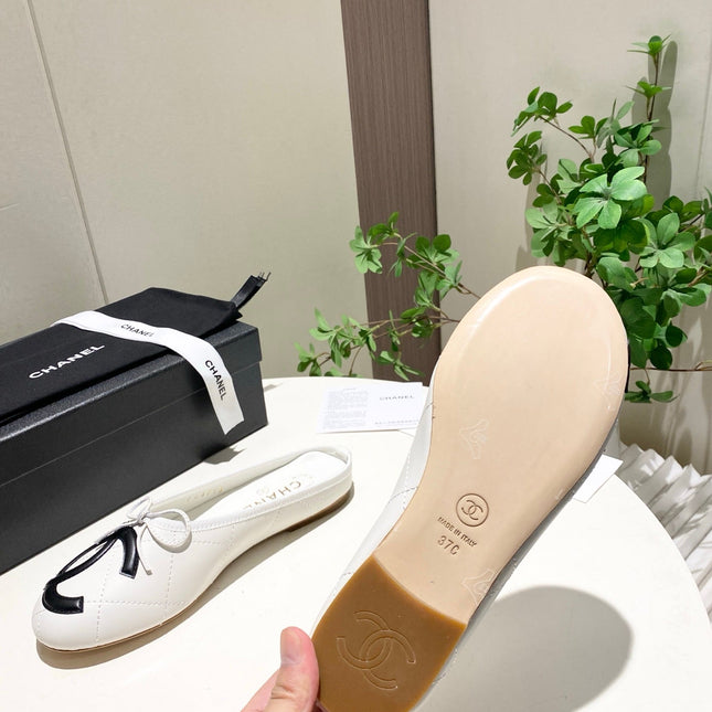 CHANEL 26S FLAT MULES IN WHITE LAMBSKIN