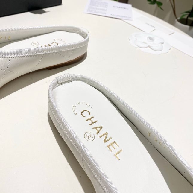CHANEL 26S FLAT MULES IN WHITE LAMBSKIN