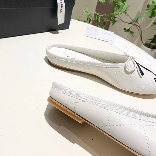 CHANEL 26S FLAT MULES IN WHITE LAMBSKIN