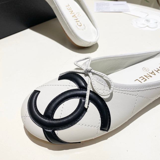CHANEL 26S FLAT MULES IN WHITE LAMBSKIN