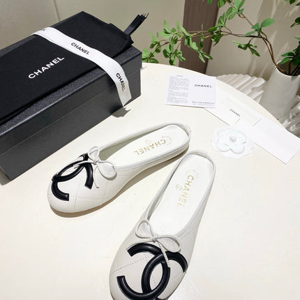 CHANEL 26S FLAT MULES IN WHITE LAMBSKIN