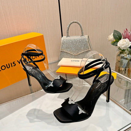 LV 26S HIGH-HEELED SANDALS 90 MM IN BLACK SATIN
