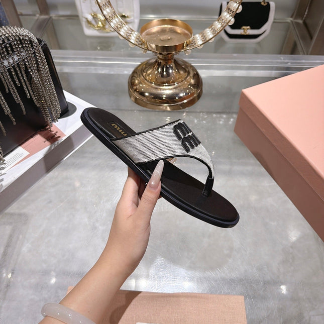 MIUMIU 26S THONG SANDALS IN WHITE CANVAS AND BLACK CALFSKIN LOGO