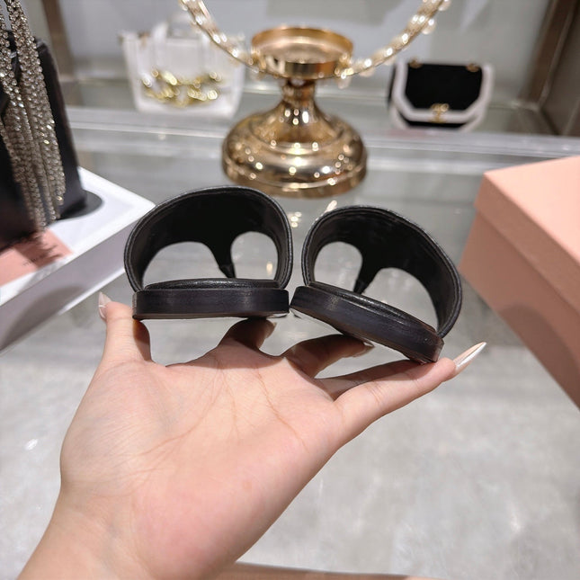 MIUMIU 26S THONG SANDALS IN WHITE CANVAS AND BLACK CALFSKIN LOGO