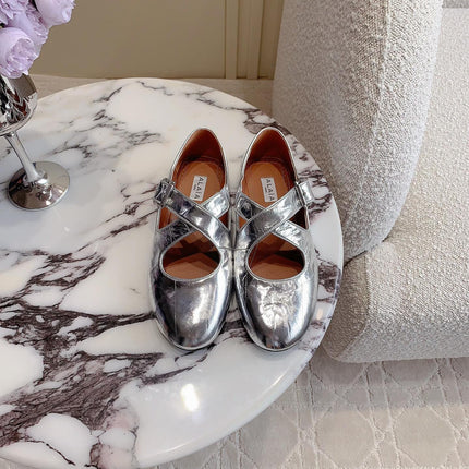 ALAIA CRISS CROSS BALLET FLAT IN SILVER LAMBSKIN